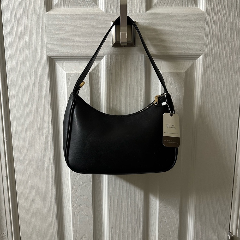 Black faux leather crescent bag
